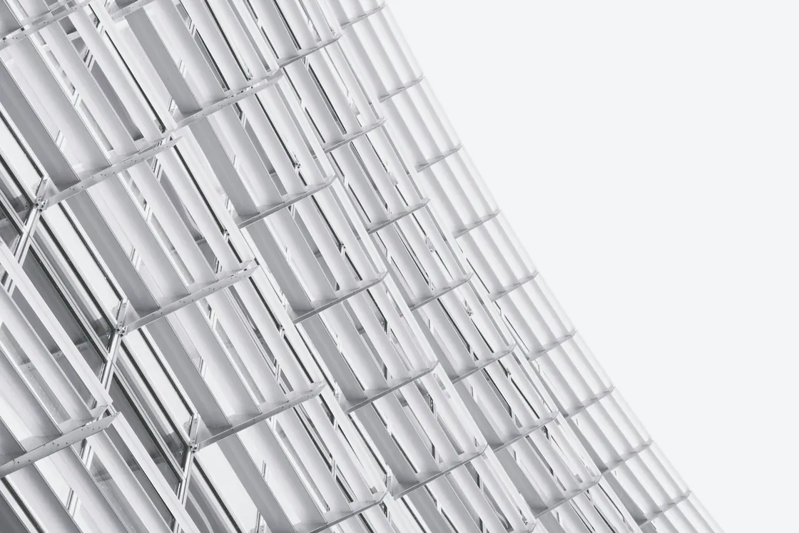 A close view of white architectural frames and glazing